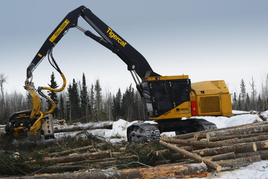 Tigercat Harvester collecting logs