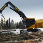 Tigercat Harvester collecting logs