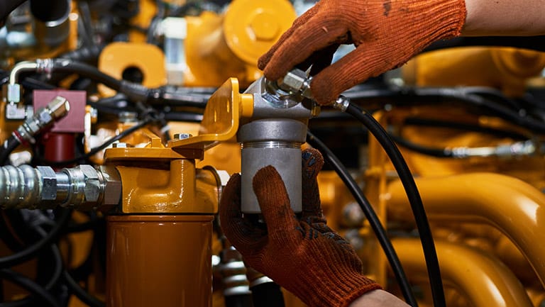 changing filter on construction machinery