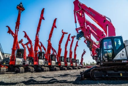 Cranes lined up at Portland Triad Machinery location to illustrate Portland Heavy Construction Equipment