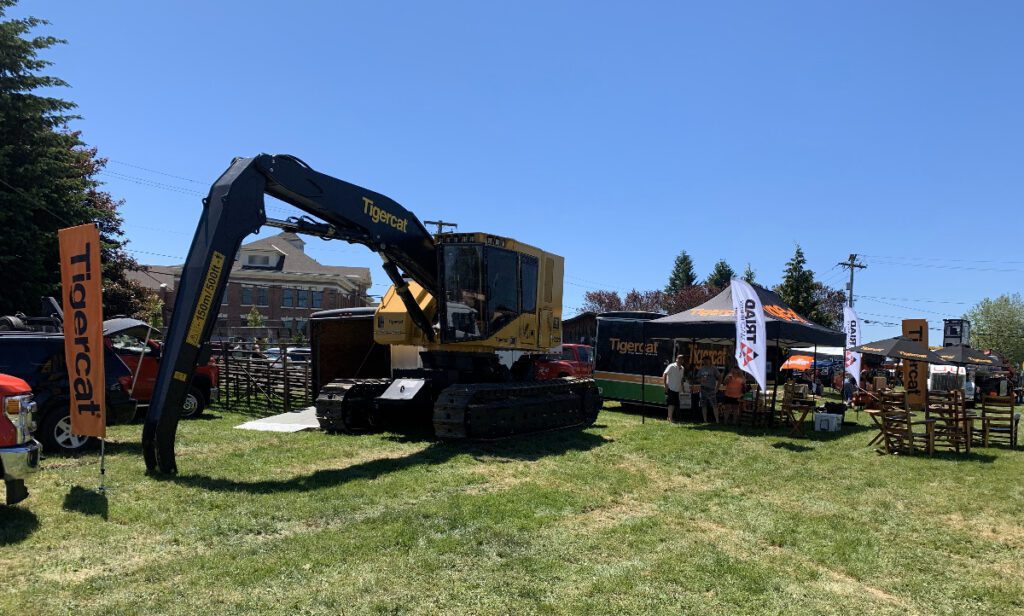 Triad Machinery showing a piece of Tigercat logging equipment at the Buckley Log Show in Buckley, WA.